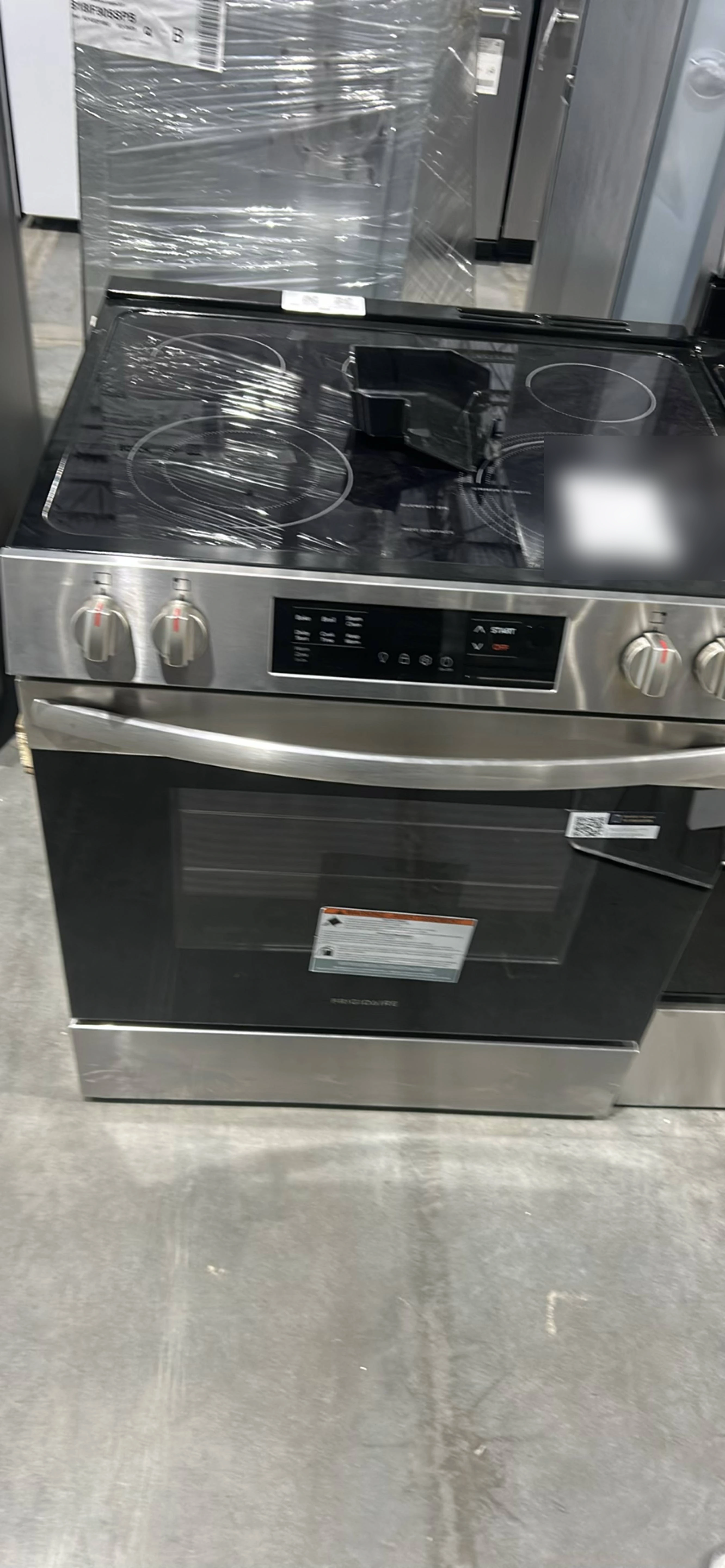 Frigidaire FCFE3062AS 30-inch 5.3 cu. ft. Slide-In Electric Range: supplier's warehouse photo of this unit